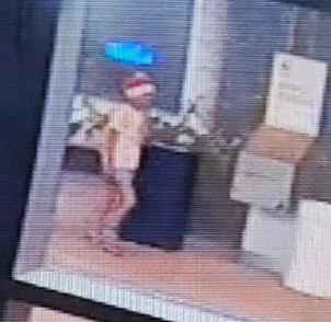 DO YOU KNOW HER? Surveillance Video Catches Would-Be Grinch Using Santa Hat as Molotov Cocktail